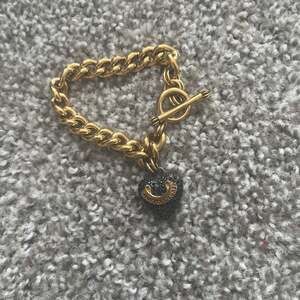 Juicy Couture Gold Plated Charm Bracelet with Black Rhinestone Heart